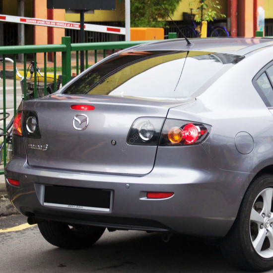 Бампер задний в цвет кузова Mazda 3 BK седан